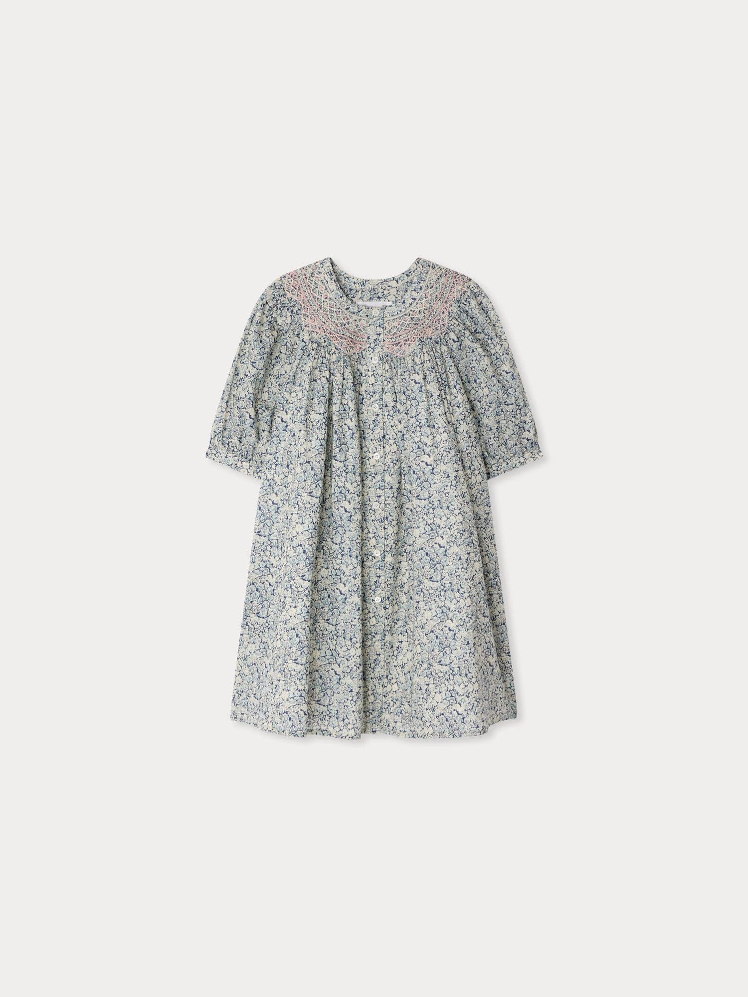 Ladwiga smocked and hand-embroidered dress in Liberty organic cotton fabric