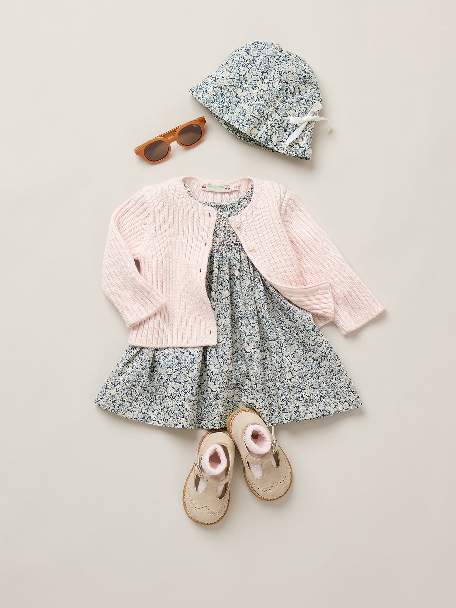 Cadelili smocked and hand-embroidered dress in Liberty organic cotton fabric