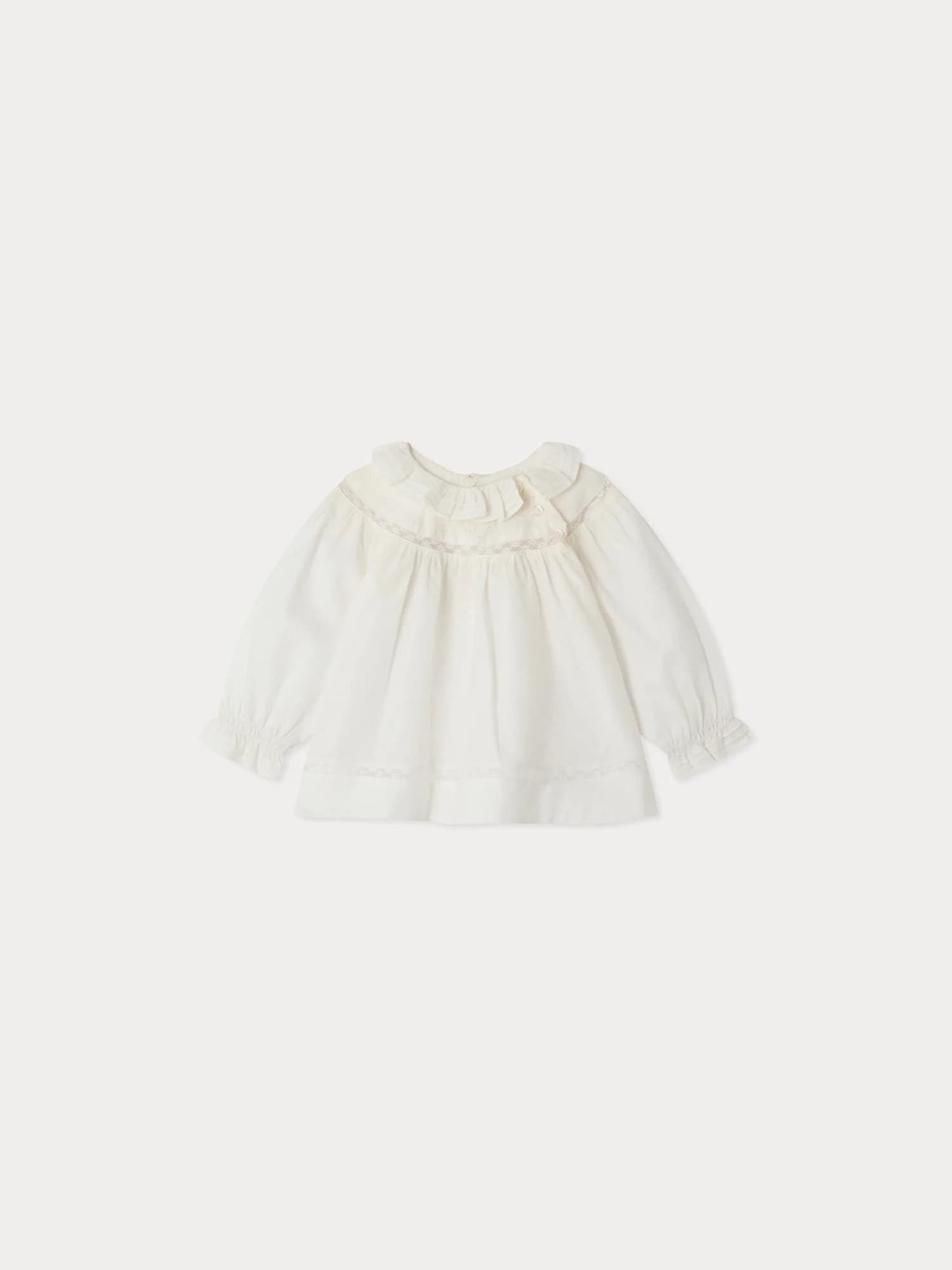 Mouchka baby blouse with ruffle collar and hand-embroidered Calais lace in organic cotton