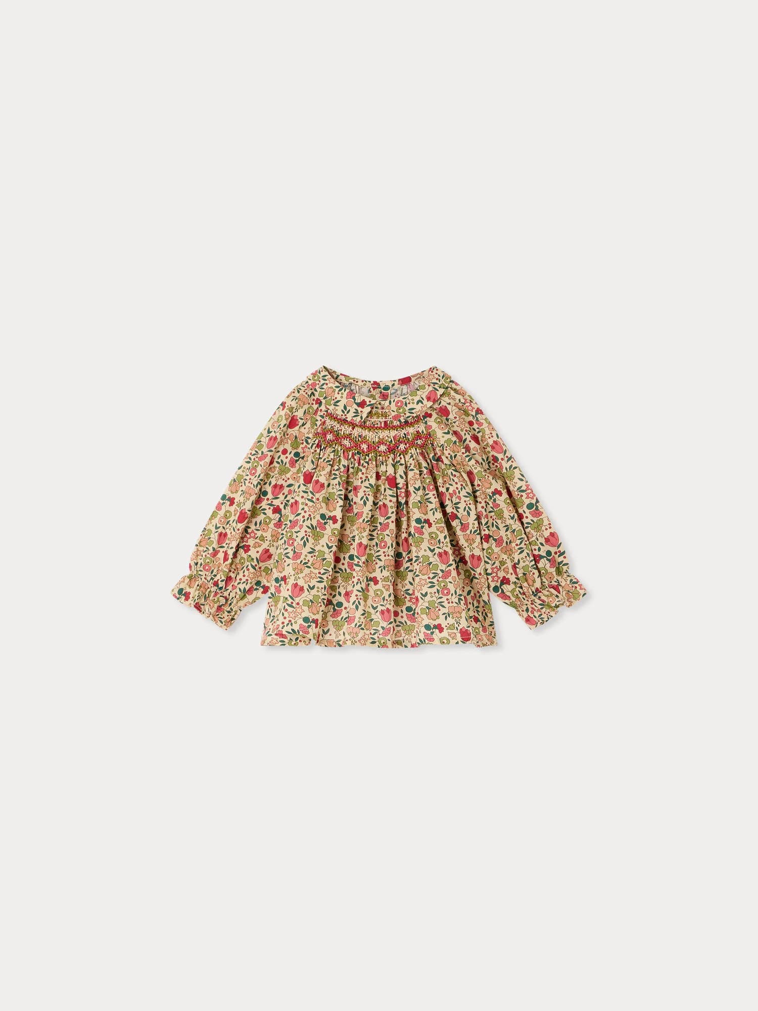 Pompom baby blouse in Liberty fabric smocked and hand-embroidered organic cotton