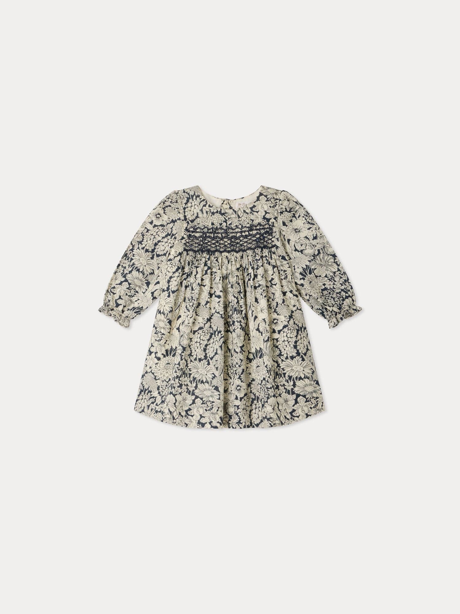 Jailys baby dress in Liberty fabric with smocking and hand embroidery in organic cotton